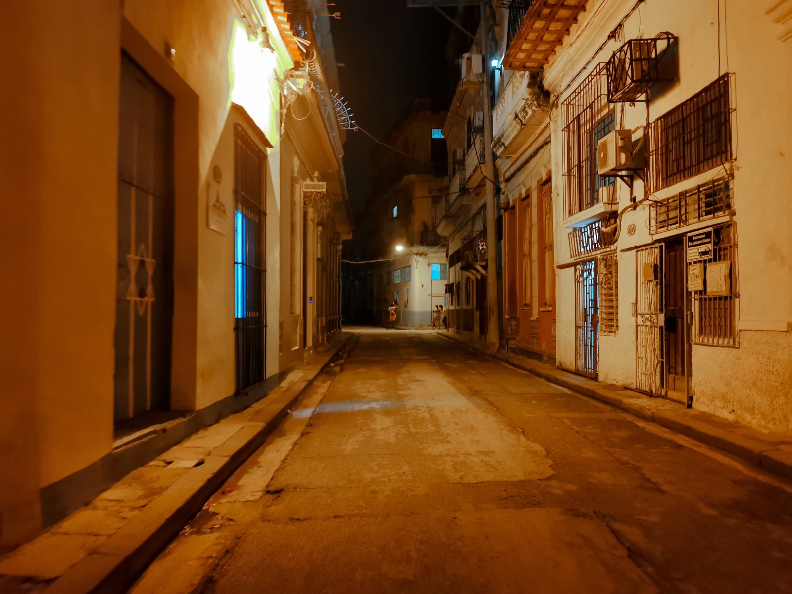 An empty street at night, a place of enduring faith